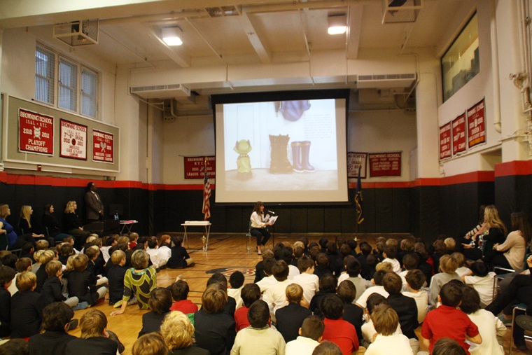 Author Elly reads my Schmitty The Weather Dog book to the Browning boys & teachers. 